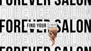 Promotional image for a salon with a striking visual. The background consists of large, bold black letters spelling 'FOREVER SALON' on a white background. Centered is a paintbrush with the text 'THE BLVD' on its metal band, painting over the words with a banner that reads 'FIND YOUR.' A lock of curly, golden-blonde hair appears as if being painted on, suggesting creativity and transformation.