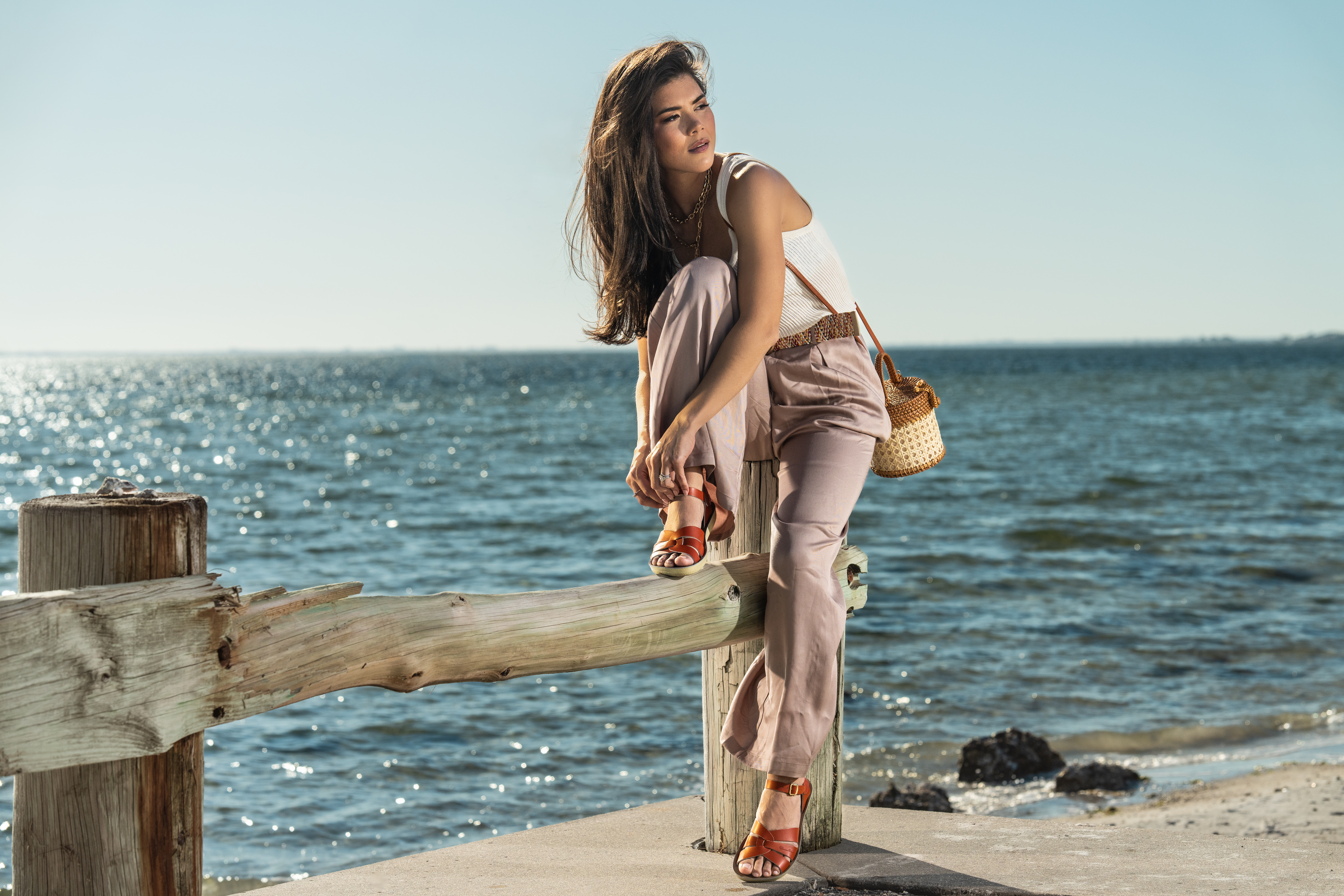 A Model Posing By The Ocean For A Drive Social Media eCommerce Photoshoot