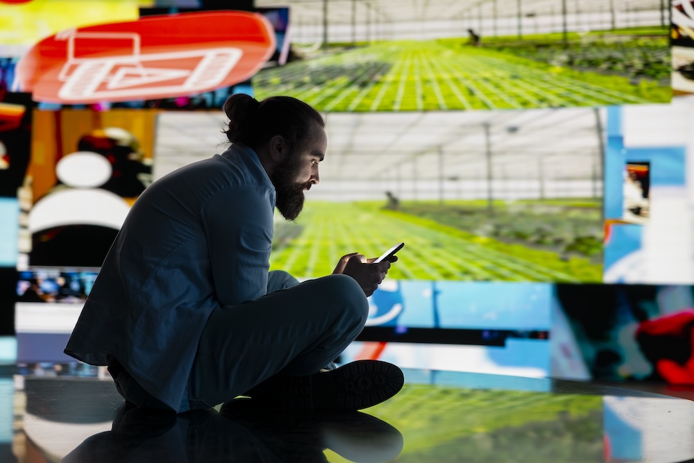 Sports journalist taking notes in a stadium, symbolising the shift from reporting box scores to telling brand stories in marketing.