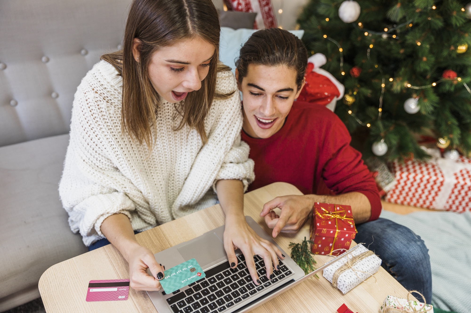 Family experiencing holiday marketing emotions together while shopping during Christmas season